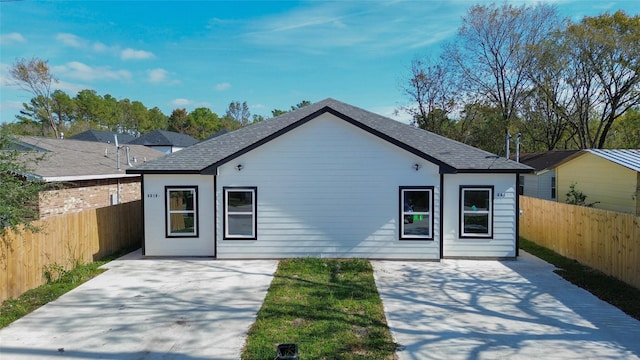 rear view of house with a patio