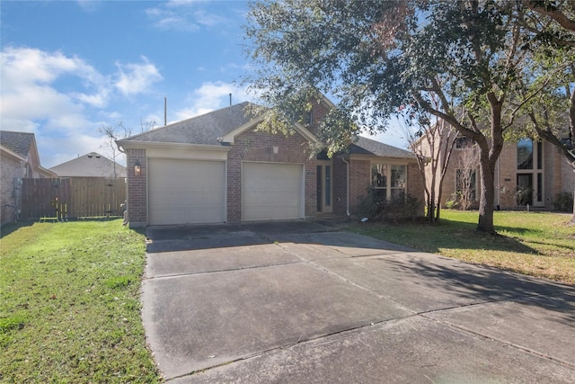 ranch-style home with a garage and a front yard