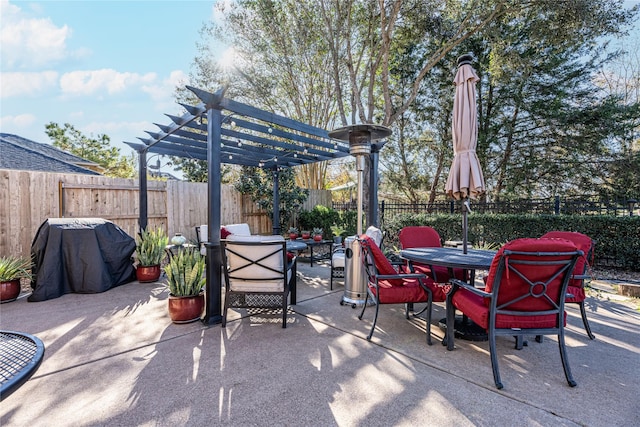 view of patio / terrace featuring a pergola and area for grilling