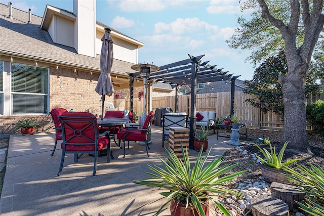 view of patio featuring a pergola