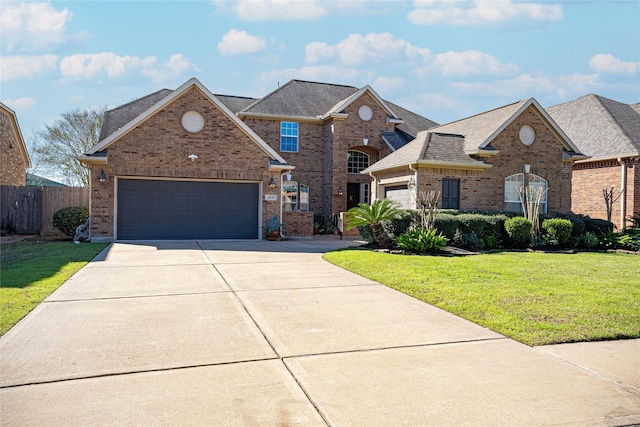 view of front property with a front yard and a garage