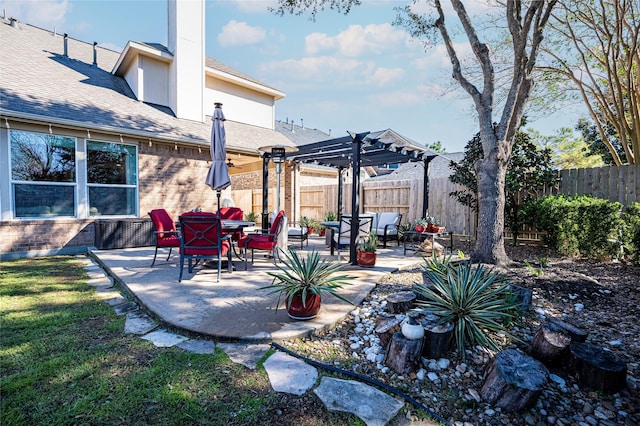 view of patio featuring a pergola