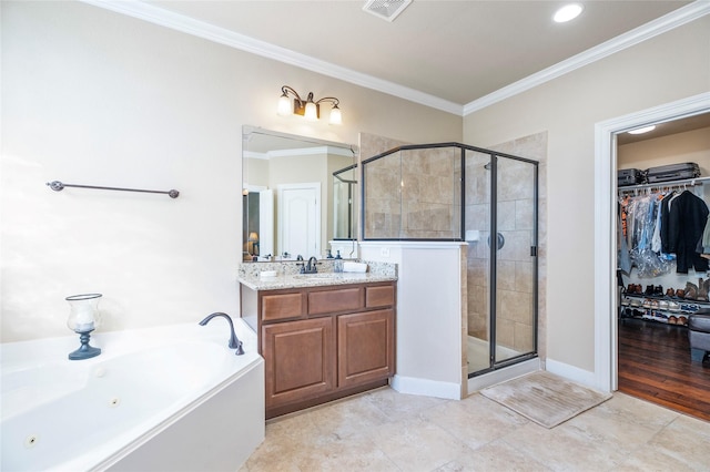 bathroom featuring separate shower and tub, tile patterned floors, vanity, and ornamental molding