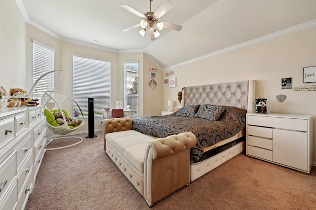 carpeted bedroom with ceiling fan, lofted ceiling, and ornamental molding