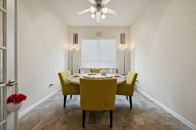 dining room featuring ceiling fan