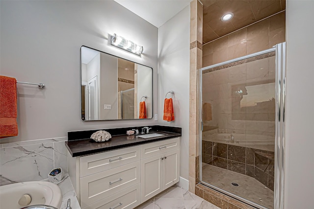 bathroom with vanity and walk in shower