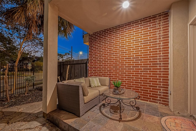 patio terrace at dusk with outdoor lounge area