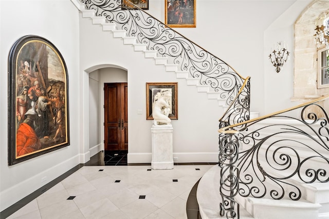 foyer with tile patterned floors