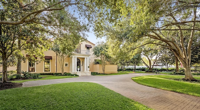 view of front of house with a front yard