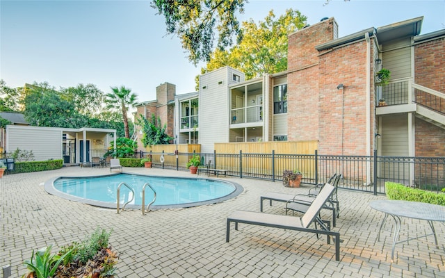 view of pool with a patio area