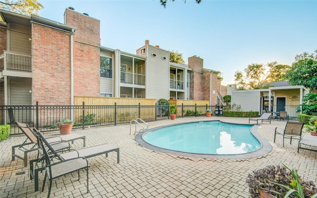 view of pool with a patio