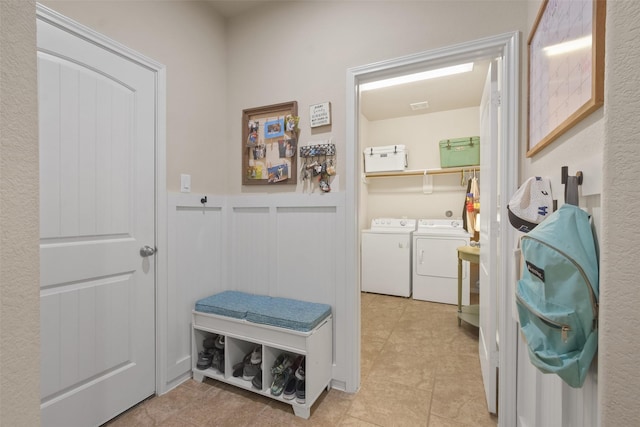 laundry area with washing machine and clothes dryer