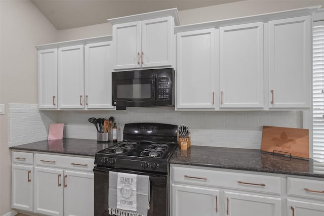 kitchen featuring black appliances, white cabinetry, dark stone counters, and tasteful backsplash