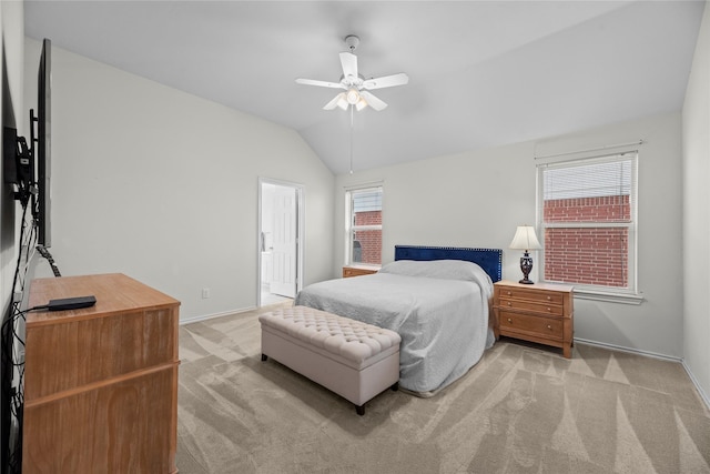 carpeted bedroom with ceiling fan, lofted ceiling, and multiple windows