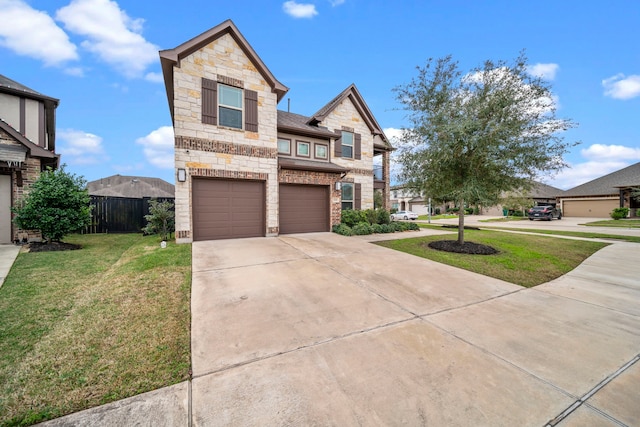 view of front facade featuring fence, a front lawn, concrete driveway, a garage, and stone siding