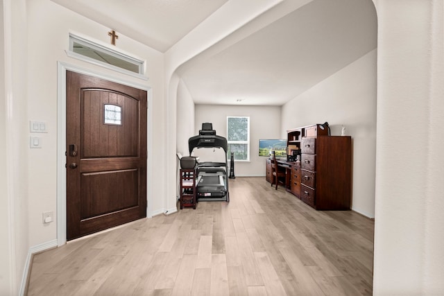 foyer entrance with light wood-type flooring