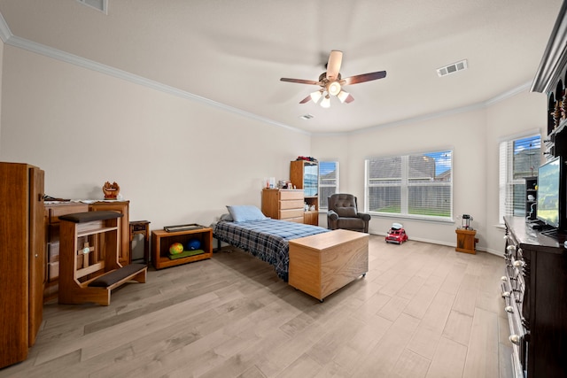 bedroom featuring ceiling fan, ornamental molding, and light hardwood / wood-style flooring