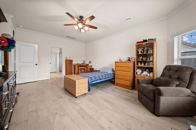 bedroom with ceiling fan, light hardwood / wood-style flooring, and crown molding