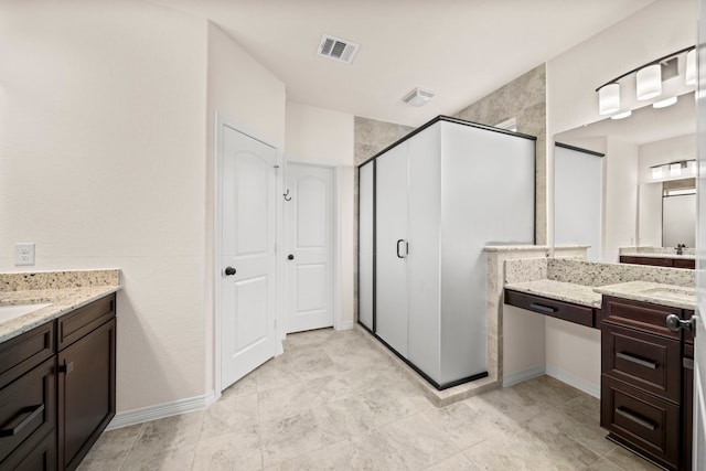 bathroom featuring vanity and walk in shower