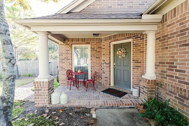 entrance to property with a porch