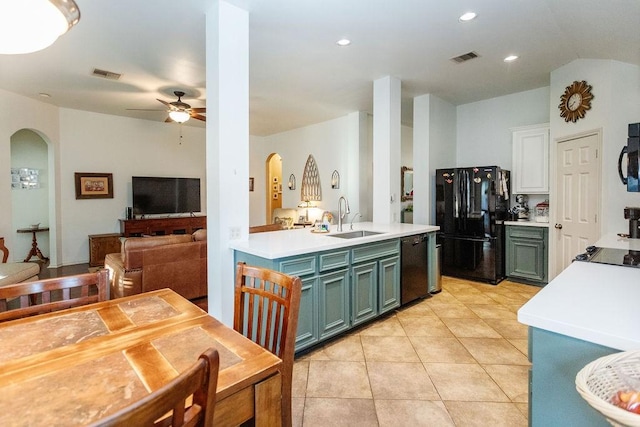 kitchen featuring white cabinetry, ceiling fan, sink, light tile patterned flooring, and black appliances