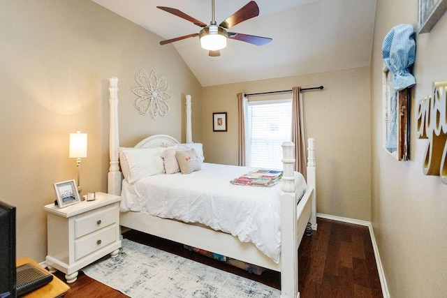 bedroom featuring wood-type flooring, vaulted ceiling, and ceiling fan