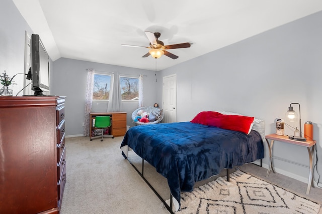 bedroom with light carpet, ceiling fan, and lofted ceiling