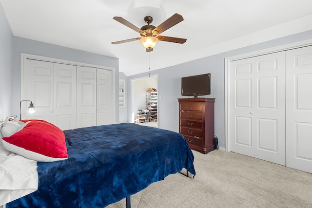 bedroom featuring light carpet and ceiling fan