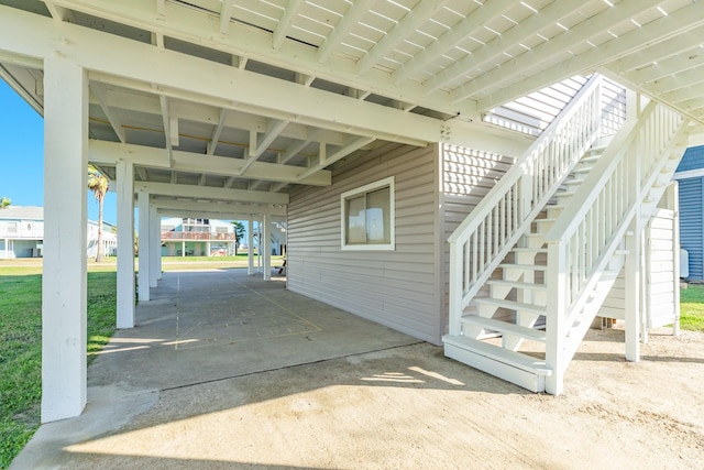 exterior space featuring a carport