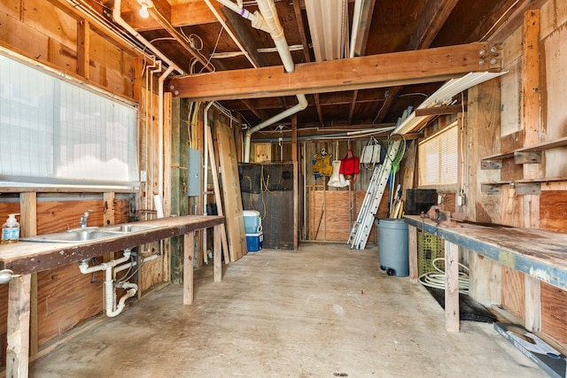 interior space featuring a workshop area and sink