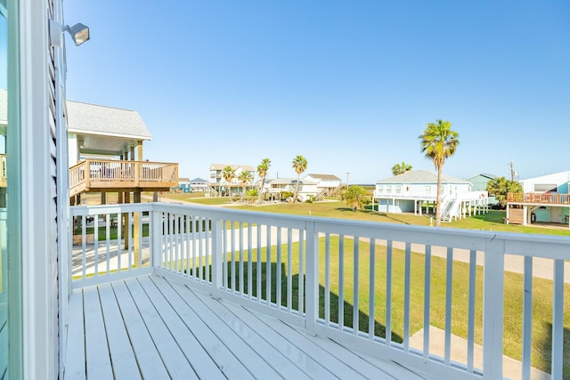 deck featuring a lawn