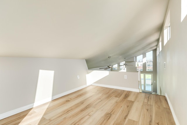 unfurnished living room featuring ceiling fan, light hardwood / wood-style floors, and high vaulted ceiling