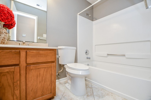 full bathroom featuring toilet, tile patterned floors, bathtub / shower combination, and vanity