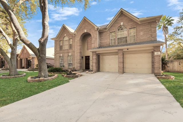 front of property featuring a garage and a front yard