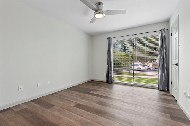 empty room featuring ceiling fan and hardwood / wood-style floors