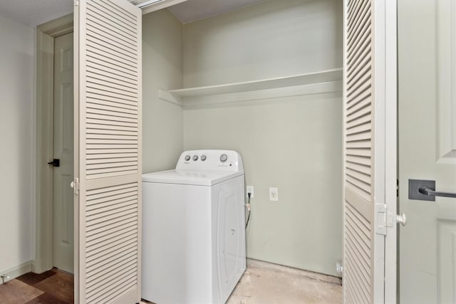 clothes washing area featuring washer / clothes dryer