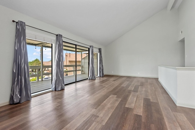 interior space featuring hardwood / wood-style floors and high vaulted ceiling