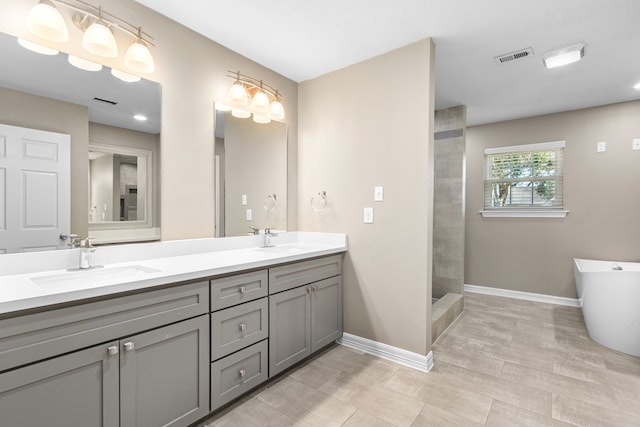 bathroom with vanity and plus walk in shower