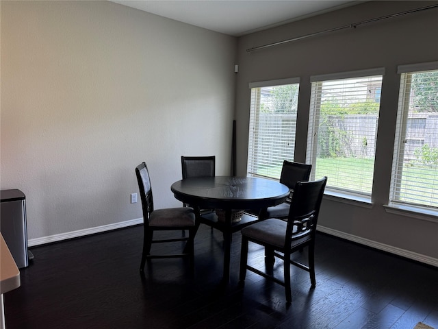 dining room featuring dark hardwood / wood-style flooring