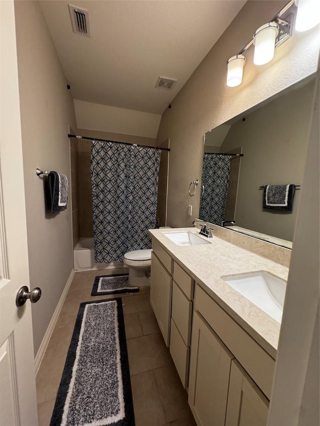 bathroom with tile patterned flooring, vanity, toilet, and a shower with shower curtain