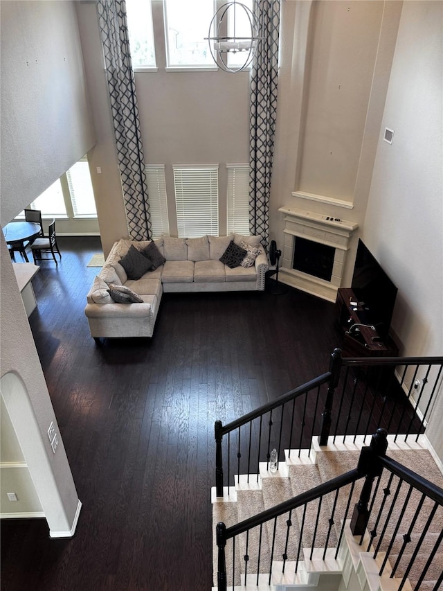 living room with dark hardwood / wood-style floors