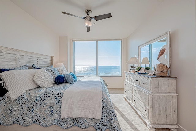 bedroom with ceiling fan and baseboards