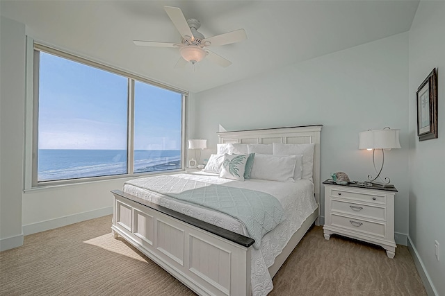 bedroom with carpet, a ceiling fan, and baseboards