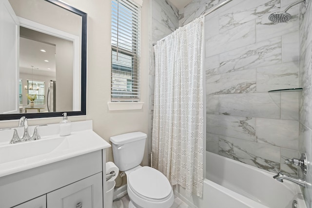 full bathroom featuring vanity, toilet, a wealth of natural light, and shower / tub combo with curtain