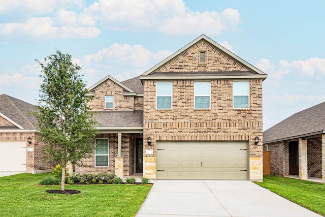 craftsman-style home featuring a garage and a front yard