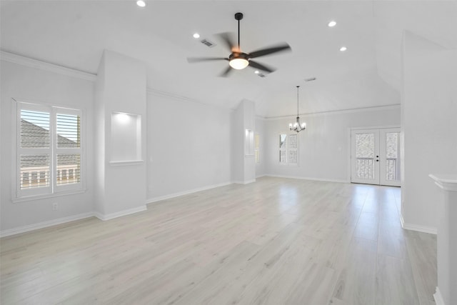 unfurnished living room featuring light wood-type flooring, french doors, and ceiling fan with notable chandelier