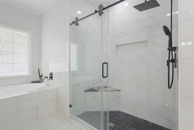 bathroom with crown molding and independent shower and bath