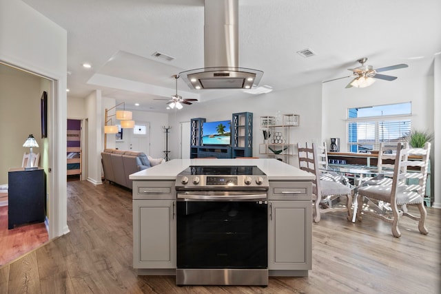 400 E Woodland Shores Dr, Point Blank, TX 77364 - kitchen featuring electric range, a ceiling fan, gray cabinets, open floor plan, and light countertops