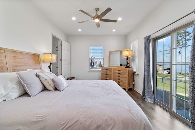 400 E Woodland Shores Dr, Point Blank, TX 77364 - bedroom featuring multiple windows, wood finished floors, recessed lighting, and a ceiling fan
