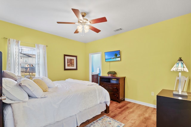 bedroom featuring ceiling fan and light hardwood / wood-style floors